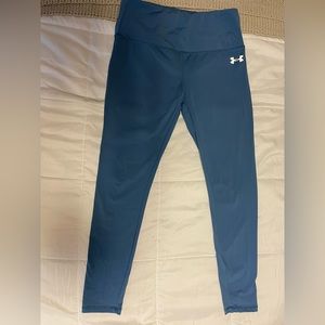 Under Armour Women's Train Leggings in blue. The size is medium.